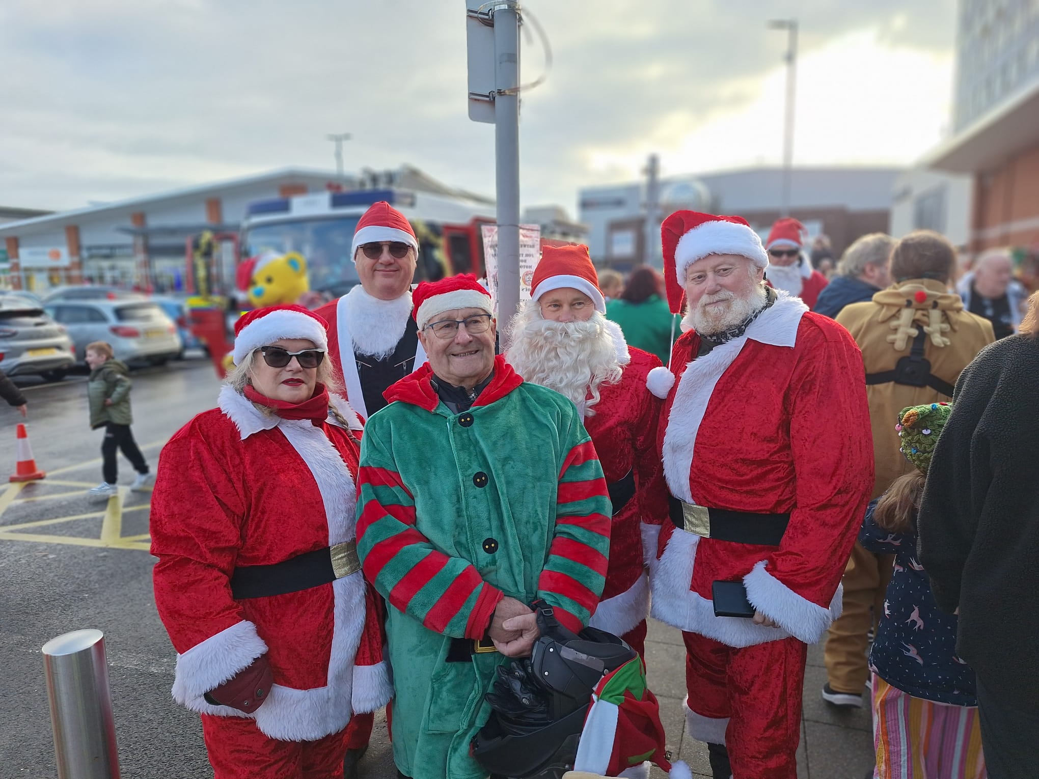 Andy with his family dressed in Christmas Costumes!
